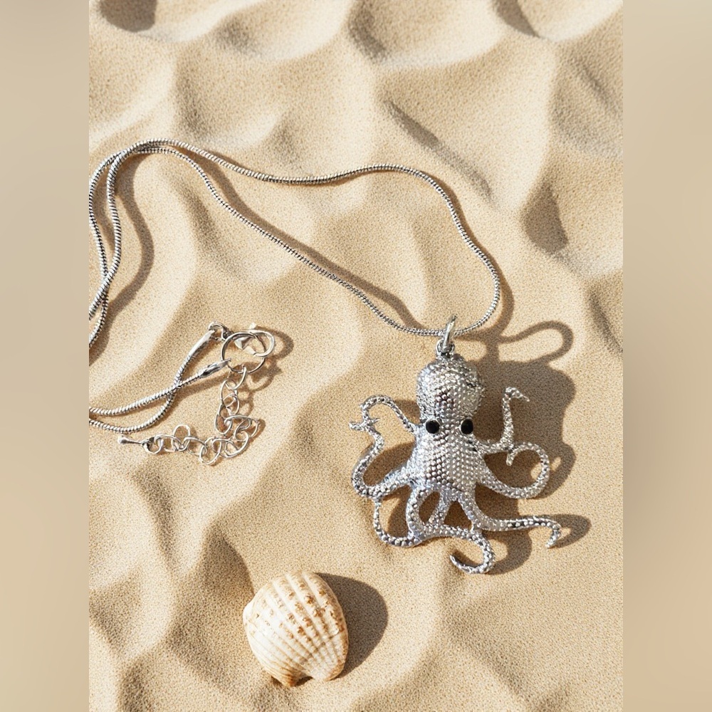 Shiny Silver Toned Octopus Pendant Necklace with Rhinestone Eyes